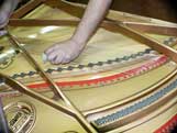 Stringing a Piano
